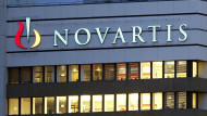 Novartis splits drugs business into two, pharma chief to leave